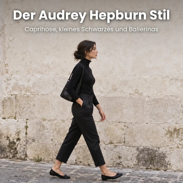 Frau in schwarzer Hose, schwarzem Rollkragenpullover und Ballerinas auf einer Altstadtstraße im Stil von Audrey Hepburn